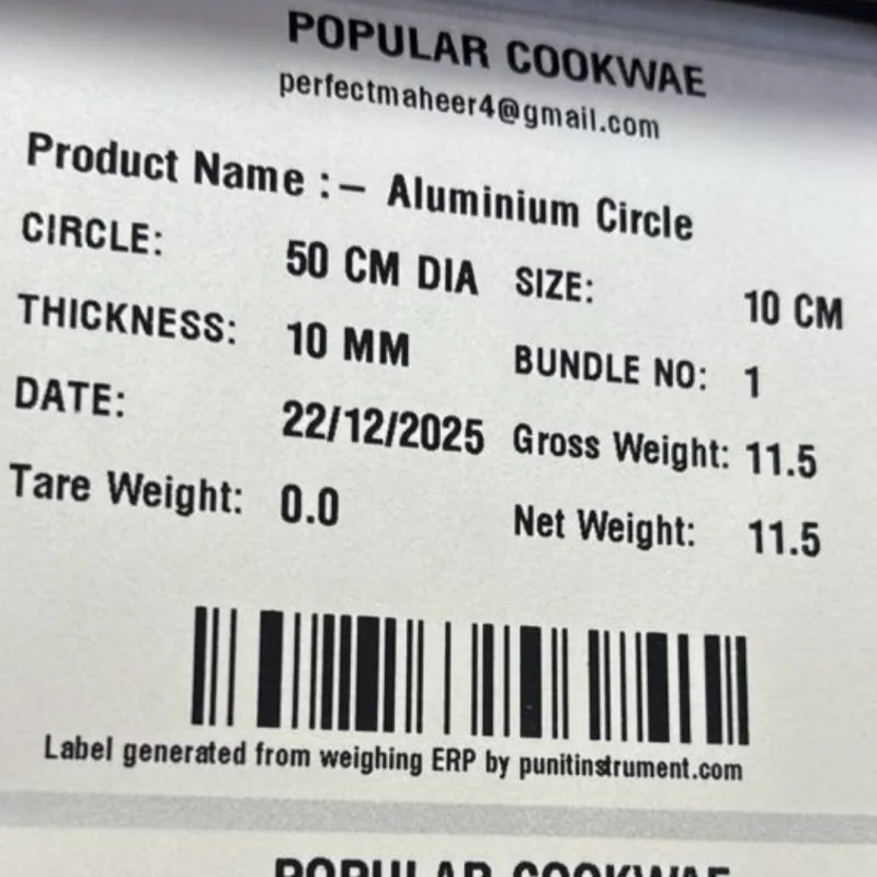 Real aluminium cookware barcode weight label printed from a Punit weighing scale with printer