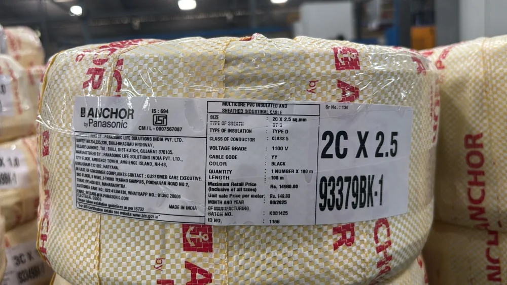 Real electrical cable packaging barcode weight label printed from a Punit weighing scale with printer