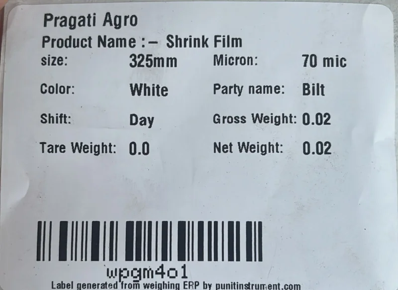 Real shrink-film production barcode weight label printed from a Punit weighing scale with printer